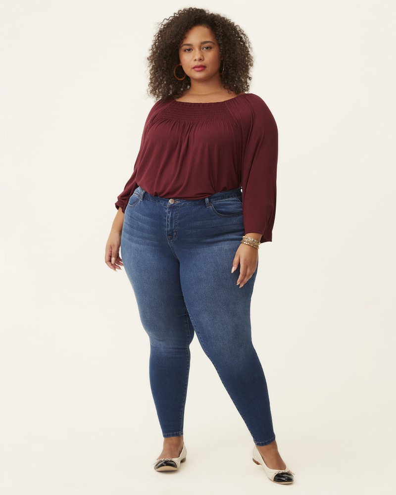 Plus size model with hourglass body shape wearing Bristol Medium Wash Skinny Jean by Meri Skye | Dia&Co | dia_product_style_image_id:182348